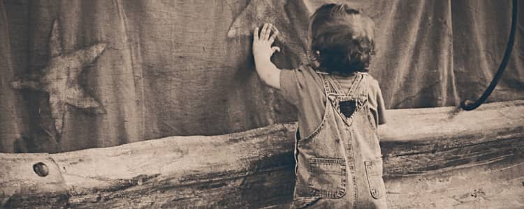 A boy leaning on the Wall A boy leaning on the Wall